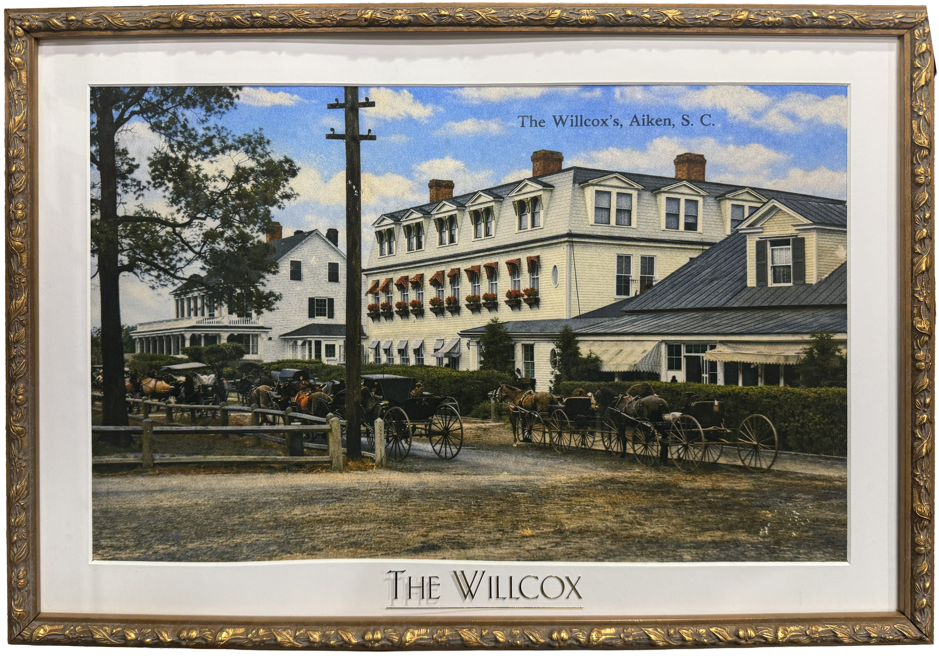 Framed restored postcard of the Willcox Inn from the early 1900's
